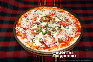Посипати емменталем
