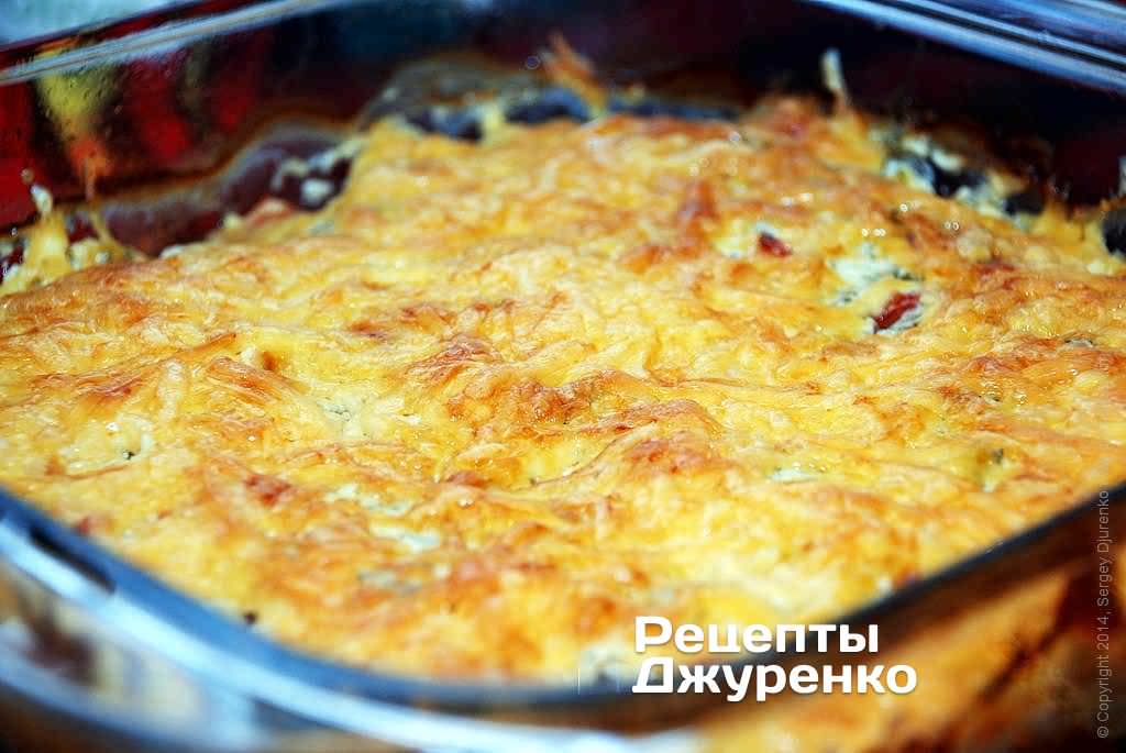 Поставить форму с рыбой в духовку .