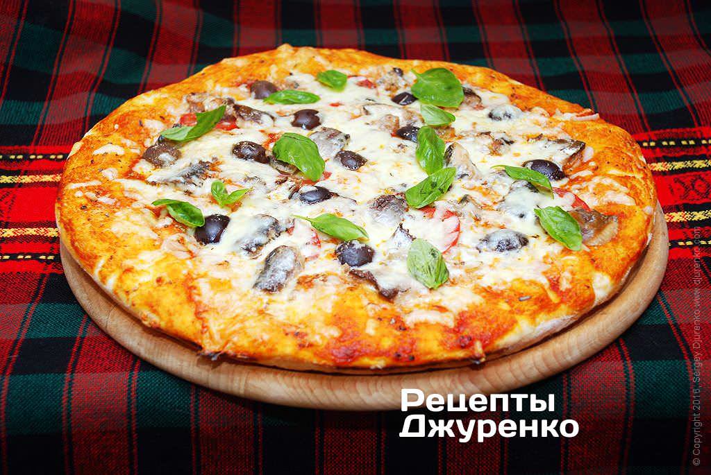 Пицца с сардинами выпекается до 20 мин.
