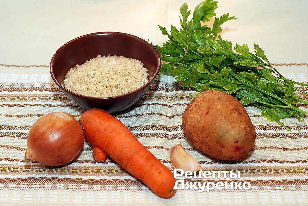 Ингредиенты: рис, картофель, морковка, лук, чеснок, петрушка, специи.