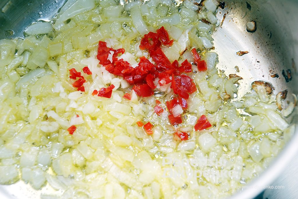 Fry onion in olive oil, add garlic and hot pepper.