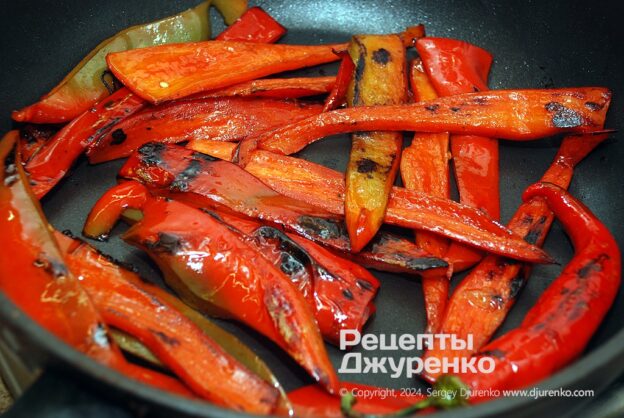 Roasting all the peppers until soft and browned.