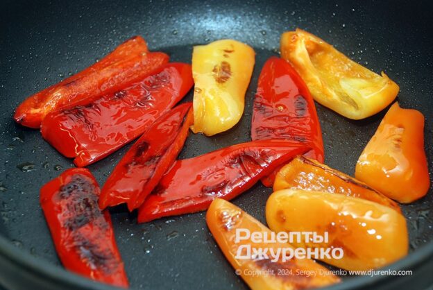 Frying the bell peppers.