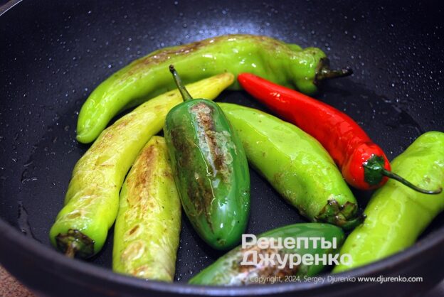 Frying the hot peppers.