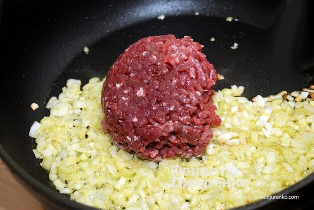 Fry the vegetables and add the ground meat.