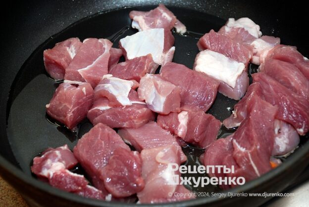 Fry the pork pieces in butter.