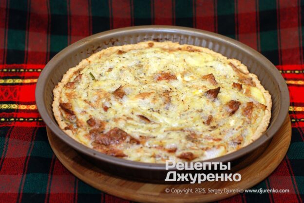Bake the quiche until the dough and custard are browned.