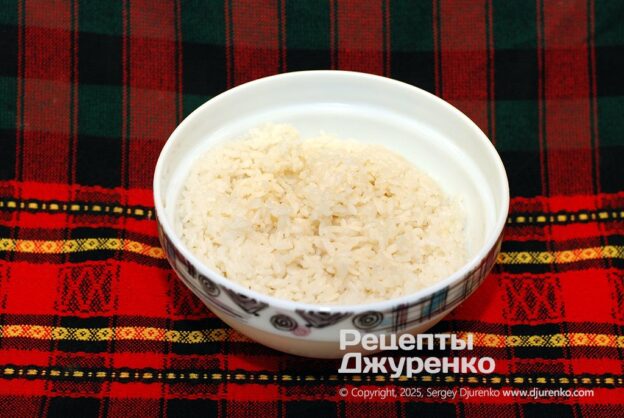 Boil the white rice until almost done.